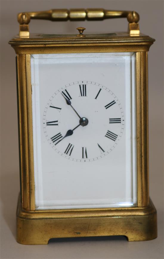 A French brass cased eight day repeating carriage clock, 4.75in ex. handle.